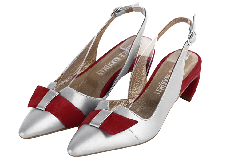 Light silver women's open back shoes, with a knot. Tapered toe. Low comma heels. Front view - Florence KOOIJMAN